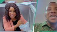 Lady working as bank cashier gets brand new iPhone from brother while at work