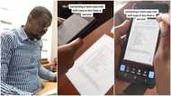 Man uses Android phone, teaches people how to convert hard copy document into soft copy with device's camera