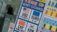 As US stocks hit records, experts see the dollar falling further