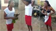 Nigerian man seen on camera removing his clothes after he was caught disguising as a woman (video)