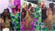 Journalist Kemi Olunloyo makes it rain cash on Azuka Ogujiuba on her 50th birthday