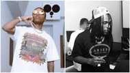 Singers Wizkid and Burna Boy pictured in a studio together