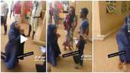 "Pls I love you": Muslim lady on her knees professes love to boy in public, his reaction causes stir