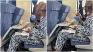 After having her morning devotion inside train, Nigerian grandma serves husband breakfast