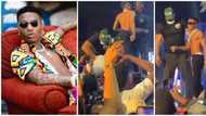 Wizkid in Abuja: Video clip captures moment 2 excited fans grabbed singer's leg at concert