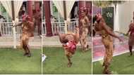 Whose sister is this? Reactions as lady almost trips on the floor, wows guests with weird dance moves in video