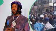 Naira Marley shares money as crowd surrounds him after Jumat prayer at a mosque in viral video