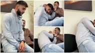 Grown-up man pranks dad by sitting on his lap, his father slaps and pushes him away in hilarious video