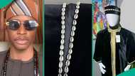Fashion designer cries out as client's wedding dress gets blocked by DHL over cowrie shells
