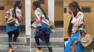 "I felt cool breeze": Video trends as lady's trouser tears inside lecture hall, friends give her wrapper