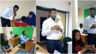 Cute photos capture Nigerian teacher carrying his student's baby as mum gets busy with classwork, many react