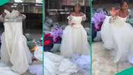Thrift seller displays okrika wedding gowns for sale, price and location spark mixed reactions