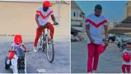 Fans gush over video of Toyin Abraham's hubby and son in matching outfits as they take bikes for a spin
