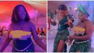 Fashion fail: Asoebi lady's choice of dressing attracts massive criticisms on social media