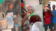 "Nobody go dey find visa": Man buys everything in food seller's coolers, shares free rice to people