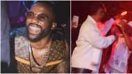 Video of moment Iyanya violently pushed man spraying him on stage goes viral, singer reacts