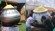 Food seller from Ghana buried inside fantasy coffin that looks like iron pot after she passed on