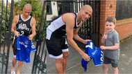 Everton star spots young fan outside his home, takes a shirt out and signs it for him