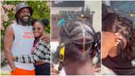 "If not that I’ve born for you, I for say God punish you": Simi trolls hubby in video as she plaits his hair