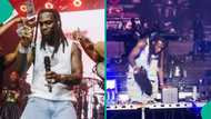 Video of Burna Boy falling on stage while performing goes viral :"Na small remain"