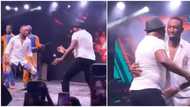 Moment 64-year-old musician Shina Peters battles BBNaija's Saga on stage at event, crowd goes wild in video