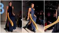 Video of model sporting hanger accessory on runway goes viral: "These designers are losing it"