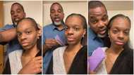 Man returns from prison after 33 years to reunite with daughter, combs her hair in beautiful family video