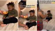 "Drama king": Little child sits like oga and refuses to eat until someone kneels to feed him, video goes viral
