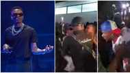 Fan pulls Wizkid's shirt and snatches his eye glasses amid security in Warri, viral video stirs reactions
