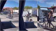 Woman rides bicycle by walking on it in viral video, it moves forward like okada, many react