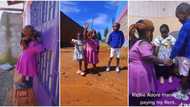 "Whenever I see her, I see hope": Video of little lady with her tall kids praying & walking goes viral online