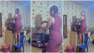 "Justice for short people": Lady stands on chair so her hand can reach gas cooker, kitchen video goes viral