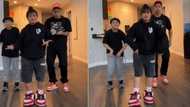 She ate it and left nothing: Reactions as mum dances with sons in video, people hail her