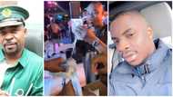 Video of MC Oluomo's son spraying fuji musician Kwam 1 with new naira notes at event sparks reactions