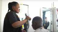 Young lady working as professional barber speaks in video, narrates how she fell in love with profession