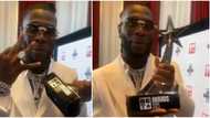 BET Awards 2021: Burna Boy happily shows off his plaque as he wins Best International Act the 3rd time