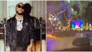 Davido almost tumbles on stage during performance as fan grabs him, singer's bouncer comes to the rescue