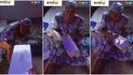 Nigerian son surprises mum with a packet of contraceptives in video, she gets angry, stirs mixed reactions
