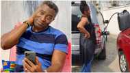 Cute photo as Nigerian lady storms her husband's office and surprises him with 50 litres of petrol