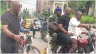 Lagos traffic is no respecter of anyone: Popular former governor takes Okada to avoid missing flight, shares photos