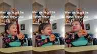 "Go Girlie": Little girl holding apple dances and twirls with big smile, video goes viral