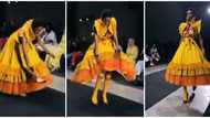 Model's confident reaction after losing shoe on runway leaves netizens impressed