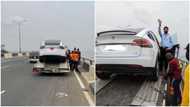 Photos capture moment Tesla car was towed away from 3rd mainland bridge in Lagos state, Nigerians react