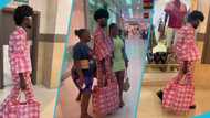 Man designs outfit from Ghana Must Go bags, walks around mall in videos, netizens react