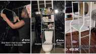 "Carry wardrobe inside": Nigerian lady changes her bathroom, covers the wall with black wallpapers, puts racks