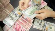 China's offshore yuan hits record low against dollar