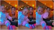 "Give her way abeg": Cute baby faces camera with confidence, tries to match mum's energy