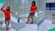 Lady shows off her luxury restroom with air conditioner, smart TV and remote-controlled toilet