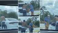 Shirtless student gets out of his car to give his belongings to homeless man, video goes viral