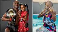 UFC champion Kamaru Usman shows off his adorable daughter as they both dance to Portable's Zazu song